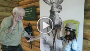 MVI 6303  Megan going through the Junior Ranger Ceremony, Main Visitor Center, Denali Nation Park