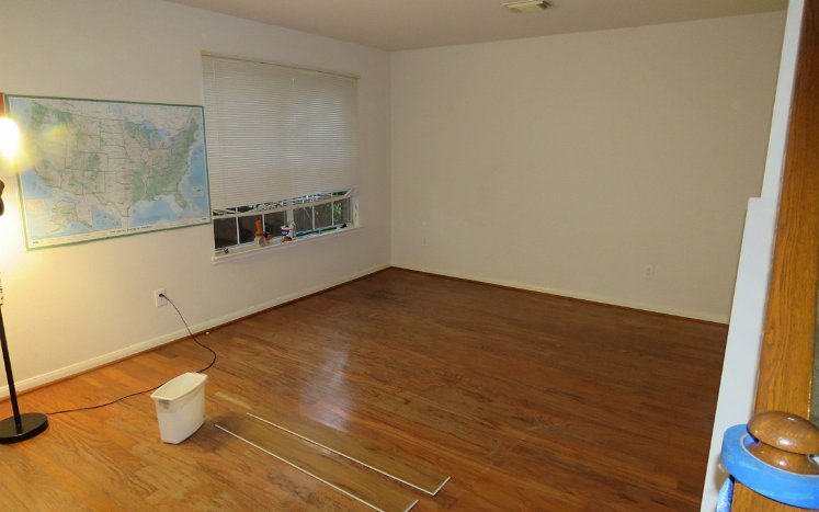 Reflooring downstairs with LVP We cleaned the garage, living and family room, and placed CoreTec Honey Walnut LVP in the Living Room, Family Room,...