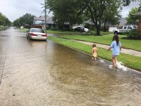 IMG_0373 Megan and Phelan enjoy the flooded streets
