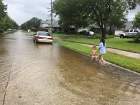 IMG_0375 Megan and Phelan enjoy the flooded streets