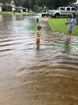 IMG_0376 Megan and Phelan enjoy the flooded streets